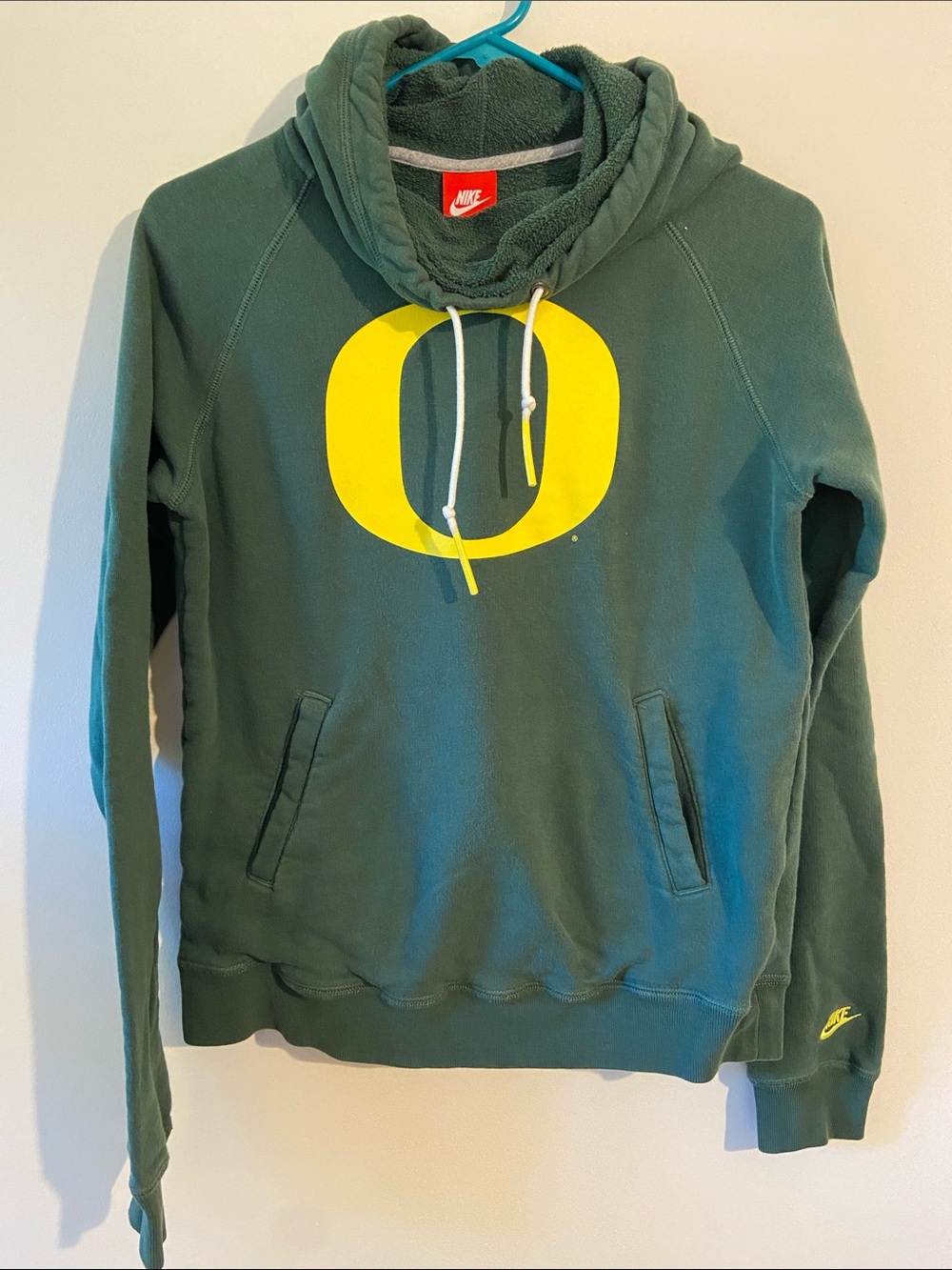 Nike Women's Green Hoodie with Yellow 'O' Logo